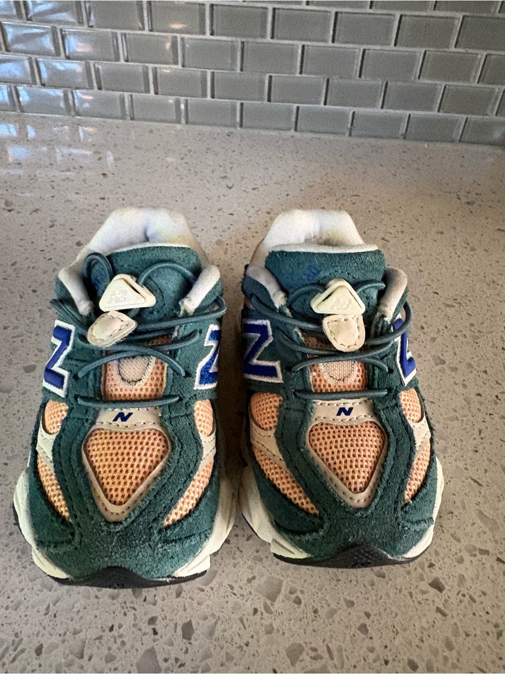 New Balance Kids Green and Tan Sneakers with Blue Accents